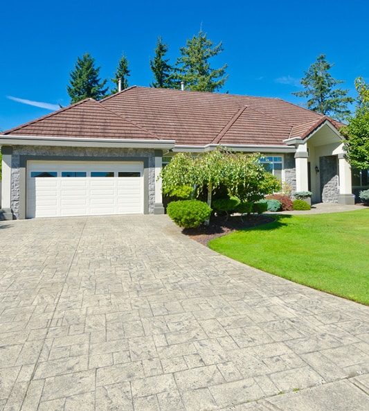 Double Doors Garage with Paved Long Driveway — Why Choose Us? in Wyong NSW